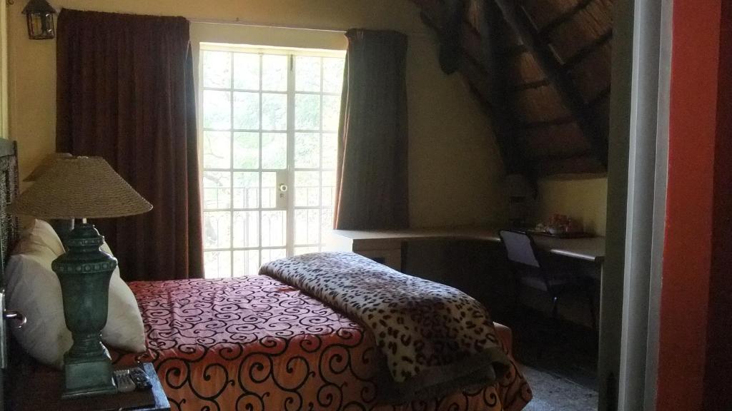 פרטוריה Treetops & Treats Guest House חדר תמונה